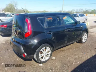 2015 Kia Soul + with VIN KNDJP3A56F7132174, listed as a IAAI auction lot 42009228 with 218,441 mi miles. Bid and sale history available at carsss.com. Image 4.