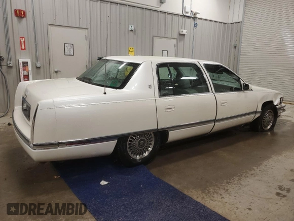 1994 Cadillac DeVille z VIN 1G6KD52B7RU290139, wystawiony jako Copart lot #46899465 z przebiegiem 133 110 mil mil oraz Czysty tytuł • Clean title. Historia ofert i sprzedaży dostępna na DreamBid. Obrazek 3.