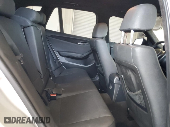 2014 BMW X1 sDrive28i z VIN WBAVM1C57EVW50653, wystawiony jako Copart lot #57309385 z przebiegiem Nie podano mil oraz Szkoda całkowita • Salvage title. Historia ofert i sprzedaży dostępna na DreamBid. Obrazek 11.