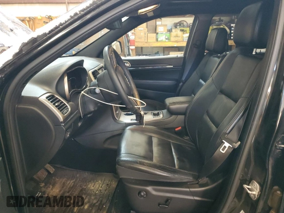 2014 Jeep Grand Cherokee Limited with VIN 1C4RJFBG5EC322141, listed as a Copart auction lot 84431254 with 162,698 mi miles and Salvage Title. Bid and sale history available at DreamBid. Image 7.
