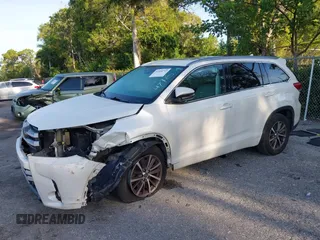 2018 Toyota Highlander SE with VIN 5TDKZRFH6JS534716, listed as a IAAI auction lot 42554743 with 154,636 mi miles and . Bid and sale history available at DreamBid. Image 18.
