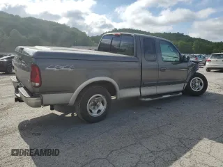 2003 Ford F-150 XL with VIN 2FTRX18L73CA49989, listed as a Copart auction lot 57434025 with 141,876 mi miles and Salvage title. Bid and sale history available at DreamBid. Image 3.