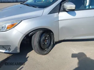 2016 Ford Focus SE with VIN 1FADP3F24GL230601, listed as a IAAI auction lot 41988130 with 176,366 mi miles. Bid and sale history available at carsss.com. Image 6.