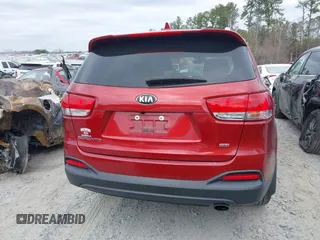 2018 Kia Sorento LX z VIN 5XYPG4A39JG400774, wystawiony jako IAAI lot #41711055 z przebiegiem 56 046 mil mil oraz . Historia ofert i sprzedaży dostępna na DreamBid. Obrazek 16.