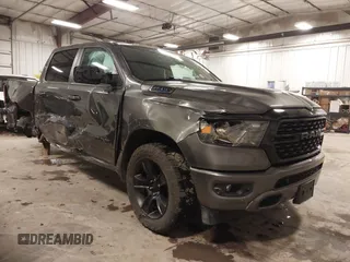 2022 Ram 1500 Big Horn with VIN 1C6SRFFT7NN331095, listed as a IAAI auction lot 41953353 with 63,424 mi miles and . Bid and sale history available at DreamBid. Image 1.