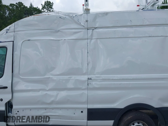 2024 Ford Transit Cargo with VIN 1FTBR3X86RKA46123, listed as a IAAI auction lot 42490695 with 13,258 mi miles and . Bid and sale history available at DreamBid. Image 14.