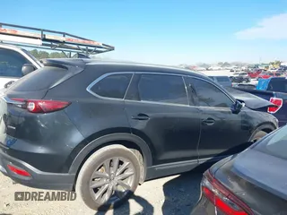 2020 Mazda CX-9 Grand Touring with VIN JM3TCADY8L0405173, listed as a IAAI auction lot 41701533 with 58,119 mi miles and . Bid and sale history available at DreamBid. Image 13.