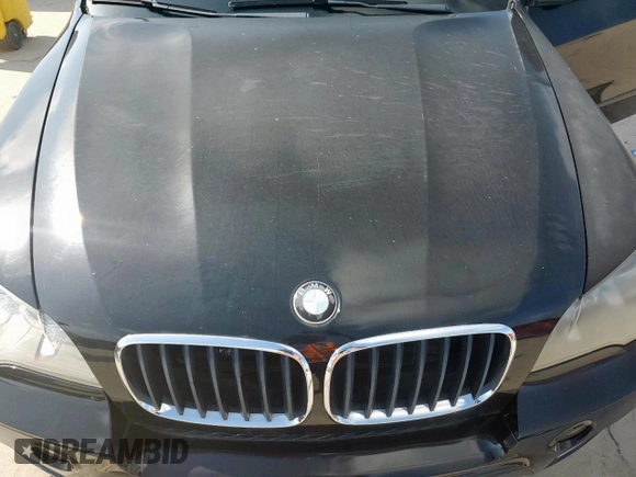 2012 BMW X5 35i с VIN 5UXZV4C52CL988794, выставлен на аукционе Copart как лот 61688485 с пробегом Не указан миль и Чистый • Clean title. История ставок и продаж доступна на DreamBid. Изображение 11.