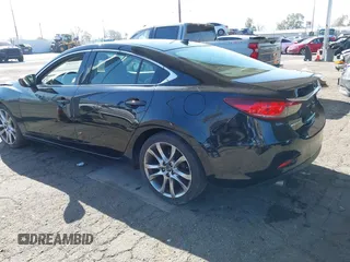 2015 Mazda 6 i Grand Touring with VIN JM1GJ1W61F1165006, listed as a IAAI auction lot 41988778 with 113,226 mi miles and . Bid and sale history available at carsss.com. Image 3.