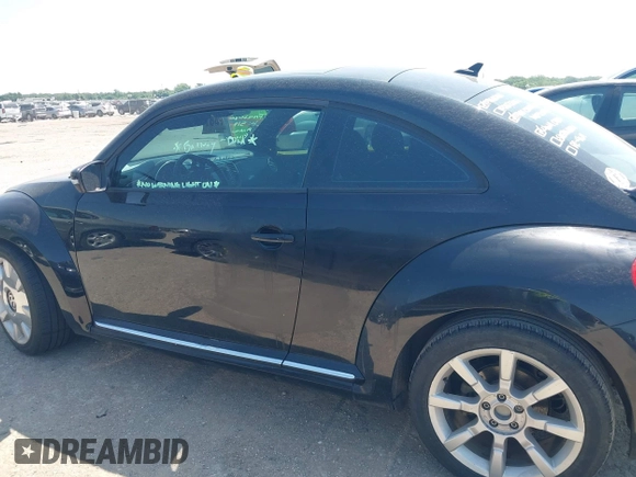 2013 Volkswagen Beetle 2.5L with VIN 3VWHX7AT3DM603962, listed as a IAAI auction lot 42329256 with 137,285 mi miles and . Bid and sale history available at DreamBid. Image 14.