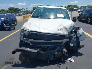 2020 Ford F-150 XL with VIN 1FTEW1E57LFC71427, listed as a IAAI auction lot 42202609 with 61,435 mi miles and . Bid and sale history available at DreamBid. Image 6.