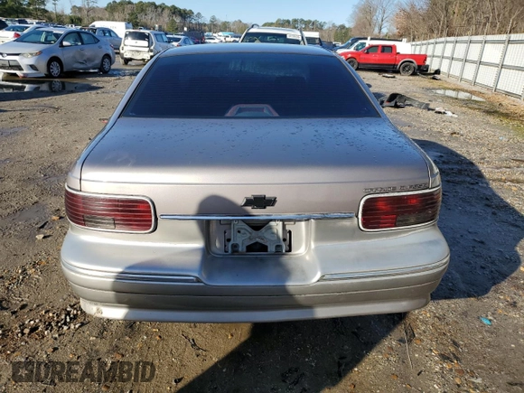 1996 Chevrolet Caprice 1SA Special Value z VIN 1G1BL52W4TR157070, wystawiony jako Copart lot #44377765 z przebiegiem Nie podano mil oraz Szkoda całkowita • Salvage title. Historia ofert i sprzedaży dostępna na DreamBid. Obrazek 6.