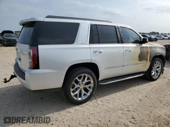 2016 GMC Yukon SLT with VIN 1GKS1BKC2GR248172, listed as a Copart auction lot 53146144 with 125,968 mi miles and Salvage Title. Bid and sale history available at carsss.com. Image 3.