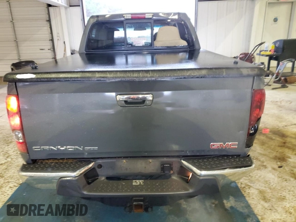2009 GMC Canyon SLE2 with VIN 1GTCS13E198128296, listed as a Copart auction lot 45133525 with 215,639 mi miles and Salvage Title. Bid and sale history available at carsss.com. Image 6.