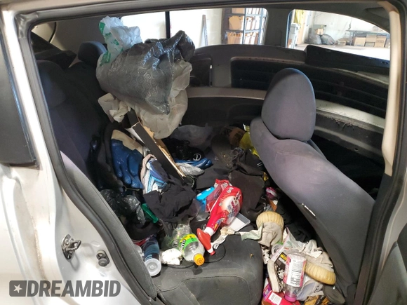 2009 Nissan Versa SL z VIN 3N1BC13E99L372095, wystawiony jako Copart lot #53188755 z przebiegiem 227 475 mil mil oraz Szkoda całkowita • Salvage title. Historia ofert i sprzedaży dostępna na DreamBid. Obrazek 10.