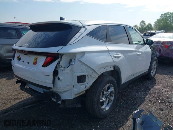 2022 Hyundai Tucson SE z VIN 5NMJACAE3NH012650, wystawiony jako IAAI lot #42137835 z przebiegiem 107 599 mil mil oraz . Historia ofert i sprzedaży dostępna na DreamBid. Obrazek 4.