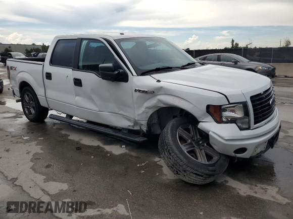 2014 Ford F-150 XL with VIN 1FTEW1CM3EFA86157, listed as a Copart auction lot 61084245 with 416,688 mi miles and Salvage title. Bid and sale history available at DreamBid. Image 4.