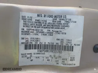 2007 Ford Focus S with VIN 1FAFP34N17W321782, listed as a IAAI auction lot 41093592 with 120,292 mi miles. Bid and sale history available at carsss.com. Image 9.