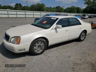 2001 Cadillac DeVille DHS z VIN 1G6KE57Y91U150835, wystawiony jako Copart lot #53244855 z przebiegiem 128 208 mil mil oraz Tytuł czysty. Historia ofert i sprzedaży dostępna na DreamBid. Obrazek 1.
