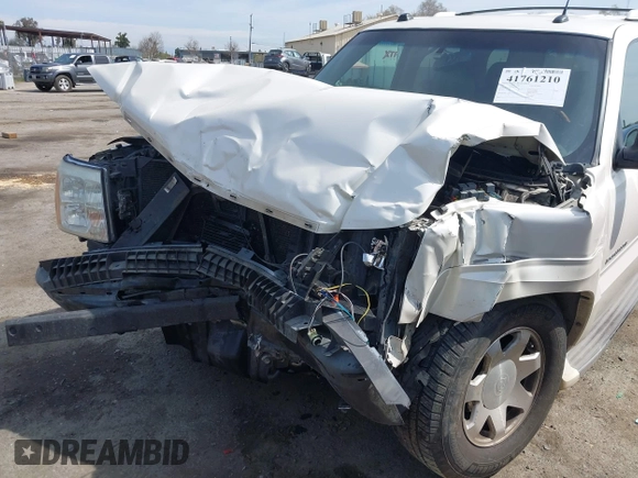 2005 Cadillac Escalade z VIN 1GYEC63N25R200026, wystawiony jako IAAI lot #41761210 z przebiegiem 226 747 mil mil oraz . Historia ofert i sprzedaży dostępna na DreamBid. Obrazek 6.