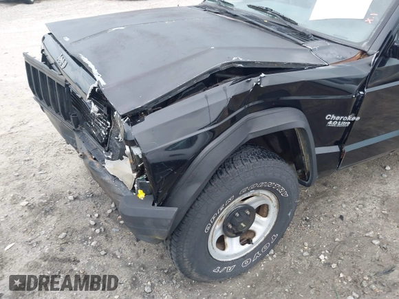 1994 Jeep Cherokee Sport with VIN 1J4FJ68S1RL160023, listed as a IAAI auction lot 41968610 with 255,978 mi miles. Bid and sale history available at carsss.com. Image 17.