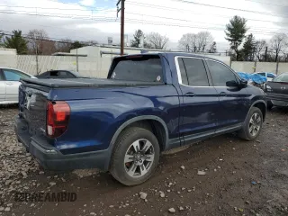 2017 Honda Ridgeline RTL with VIN 5FPYK3F57HB011597, listed as a Copart auction lot 49307885 with 140,157 mi miles and Salvage title. Bid and sale history available at DreamBid. Image 3.