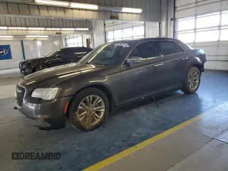 2015 Chrysler 300 C with VIN 2C3CCAEG9FH755835, listed as a Copart auction lot 83204214 with 121,729 mi miles and Salvage Title. Bid and sale history available at carsss.com. Image 1.