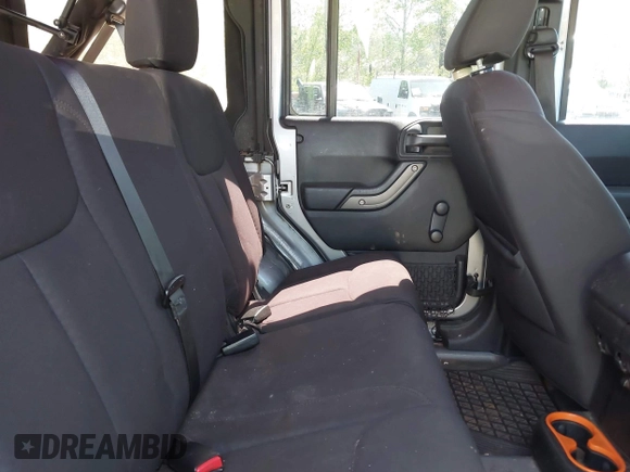 2014 Jeep Wrangler Unlimited Sport with VIN 1C4BJWDG4EL292421, listed as a IAAI auction lot 42034343 with 157,820 mi miles. Bid and sale history available at carsss.com. Image 8.