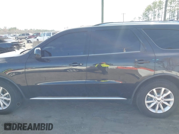 2014 Dodge Durango SXT with VIN 1C4RDHAG9EC266905, listed as a IAAI auction lot 41468103 with 162,150 mi miles and . Bid and sale history available at DreamBid. Image 14.