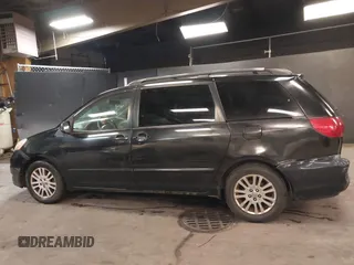 2009 Toyota Sienna XLE with VIN 5TDZK22C19S232024, listed as a IAAI auction lot 42081485 with 179,257 mi miles. Bid and sale history available at carsss.com. Image 14.