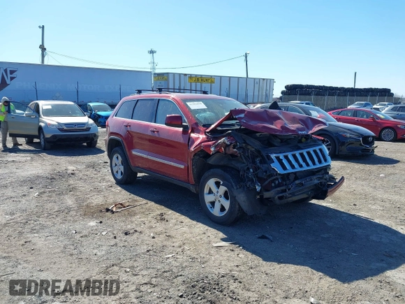 2012 Jeep Grand Cherokee Laredo with VIN 1C4RJFAG4CC297151, listed as a IAAI auction lot 41903618 with 222,357 mi miles. Bid and sale history available at carsss.com. Image 1.