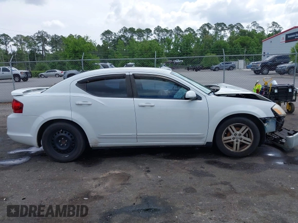 2012 Dodge Avenger SXT with VIN 1C3CDZCB5CN156288, listed as a IAAI auction lot 42115638 with 157,534 mi miles and . Bid and sale history available at DreamBid. Image 13.