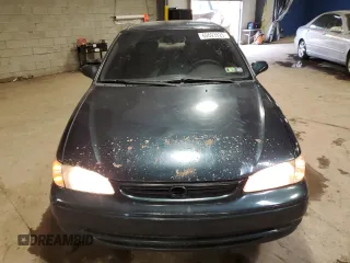 1999 Toyota Corolla VE with VIN 2T1BR12E2XC136739, listed as a Copart auction lot 60693625 with 170,989 mi miles and Salvage title. Bid and sale history available at DreamBid. Image 5.