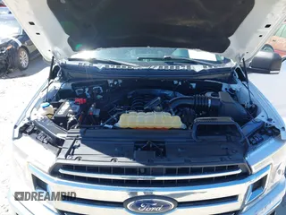 2018 Ford F-150 XL with VIN 1FTFX1C57JKF08037, listed as a IAAI auction lot 41863806 with 195,725 mi miles and . Bid and sale history available at DreamBid. Image 10.