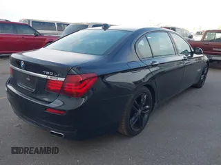 2015 BMW 7 Series 750Li xDrive with VIN WBAYF8C55FD654949, listed as a IAAI auction lot 41659763 with 91,837 mi miles and . Bid and sale history available at carsss.com. Image 4.
