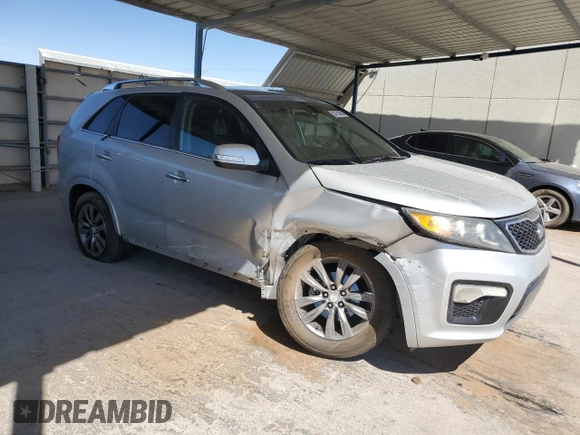 2013 Kia Sorento SX with VIN 5XYKW4A25DG312538, listed as a Copart auction lot 53753565 with 132,883 mi miles and Salvage title. Bid and sale history available at DreamBid. Image 4.
