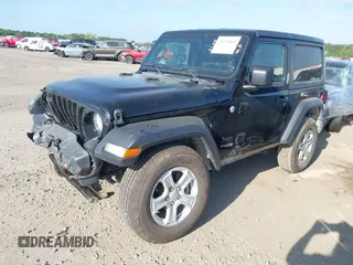 2021 Jeep Wrangler Sport S with VIN 1C4HJXAG6MW744998, listed as a IAAI auction lot 42170965 with 59,373 mi miles and . Bid and sale history available at DreamBid. Image 2.
