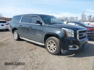 2015 GMC Yukon XL SLE z VIN 1GKS2GKC8FR248489, wystawiony jako IAAI lot #41610872 z przebiegiem 171 454 mil mil oraz . Historia ofert i sprzedaży dostępna na DreamBid. Obrazek 1.