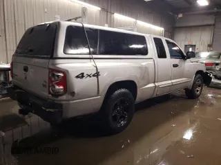2006 Dodge Dakota SLT with VIN 1D7HW42NX6S711998, listed as a Copart auction lot 80129394 with 214,546 mi miles and Salvage Title. Bid and sale history available at carsss.com. Image 3.