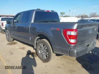 2021 Ford F-150 XL with VIN 1FTEW1C56MFA89903, listed as a IAAI auction lot 41657308 with 105,626 mi miles. Bid and sale history available at carsss.com. Image 3.