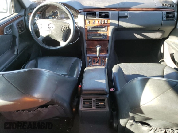 2000 Mercedes-Benz E-Class with VIN WDBJF82J5YX030071, listed as a Copart auction lot 42430025 with 122,612 mi miles and Salvage Title. Bid and sale history available at carsss.com. Image 8.