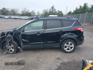 2016 Ford Escape SE with VIN 1FMCU9GX6GUA81609, listed as a IAAI auction lot 41947984 with 159,254 mi miles. Bid and sale history available at carsss.com. Image 14.