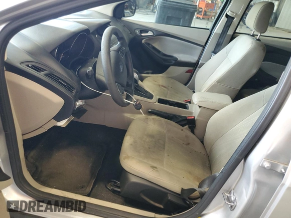 2018 Ford Focus SE z VIN 1FADP3FE9JL234158, wystawiony jako Copart lot #51788755 z przebiegiem 99 877 mil mil oraz Szkoda całkowita • Salvage title. Historia ofert i sprzedaży dostępna na DreamBid. Obrazek 7.