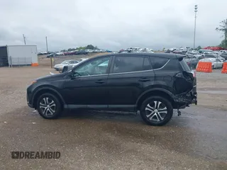 2018 Toyota RAV4 LE with VIN 2T3BFREV8JW777510, listed as a IAAI auction lot 41974675 with 62,795 mi miles. Bid and sale history available at carsss.com. Image 15.