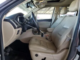 2014 Jeep Grand Cherokee Limited with VIN 1C4RJFBG7EC588986, listed as a Copart auction lot 52284405 with 92,702 mi miles and Salvage Title. Bid and sale history available at DreamBid. Image 7.