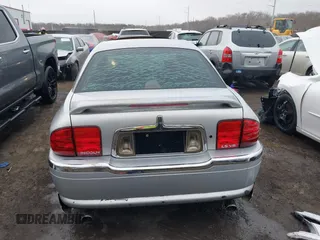 2002 Lincoln LS w/Base Pkg with VIN 1LNHM87A12Y607979, listed as a IAAI auction lot 41523445 with 174,826 mi miles. Bid and sale history available at carsss.com. Image 16.
