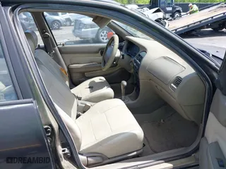 1996 Geo Prizm LSi with VIN 1Y1SK526XTZ026795, listed as a IAAI auction lot 42008701 with 178,017 mi miles. Bid and sale history available at carsss.com. Image 5.