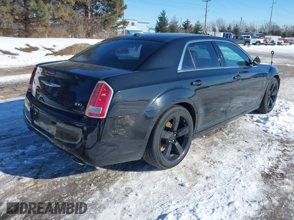 2012 Chrysler 300 S with VIN 2C3CCABG7CH140782, listed as a IAAI auction lot 41343344 with 244,577 mi miles and . Bid and sale history available at carsss.com. Image 4.