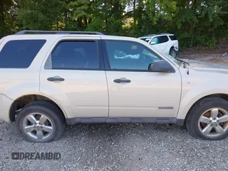 2008 Ford Escape XLT with VIN 1FMCU93198KE17879, listed as a IAAI auction lot 40125825 with 214,373 mi miles and . Bid and sale history available at DreamBid. Image 14.