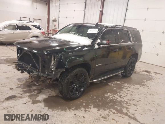 2016 GMC Yukon SLE with VIN 1GKS2AKC1GR276262, listed as a IAAI auction lot 41336378 with 213,182 mi miles. Bid and sale history available at carsss.com. Image 2.
